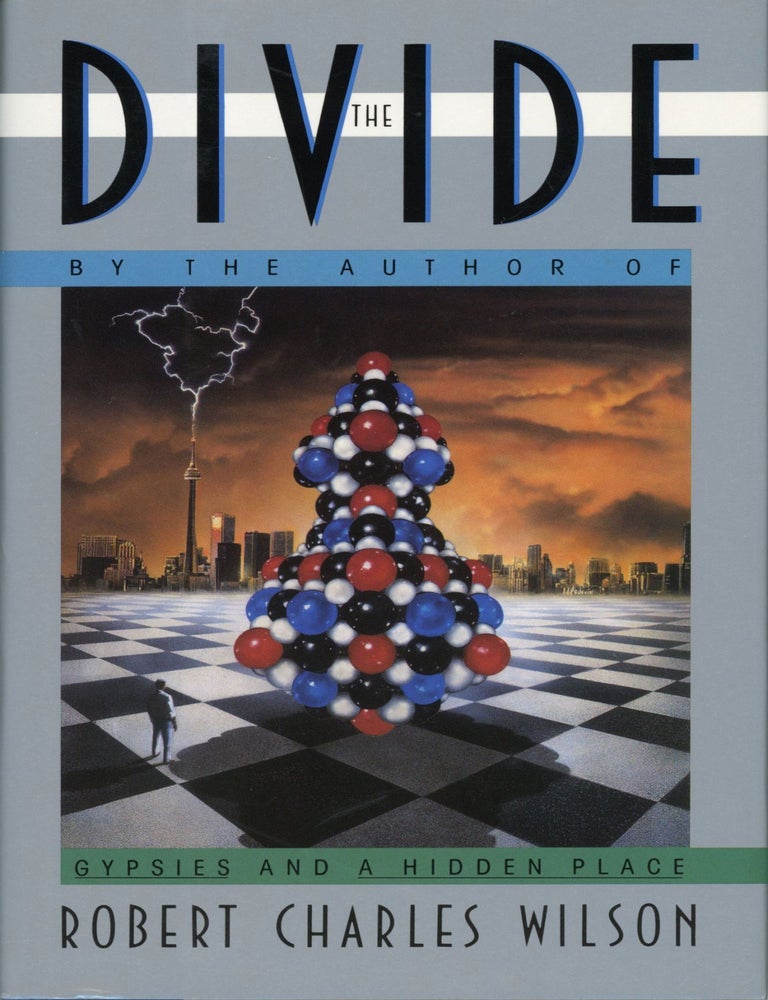 THE DIVIDE. Robert Charles Wilson.