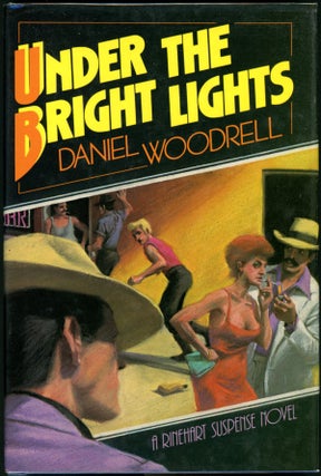 Item #4822 UNDER THE BRIGHT LIGHTS. Daniel Woodrell